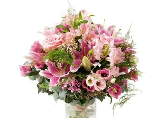 Bouquet di rose, lisianthus, gigli, alstroemeria e verde decorativo